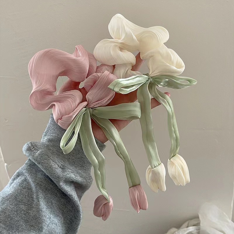 Adakah terdapat sebarang diskaun untuk membeli Tulip flower bow hair scrunchies secara pukal?